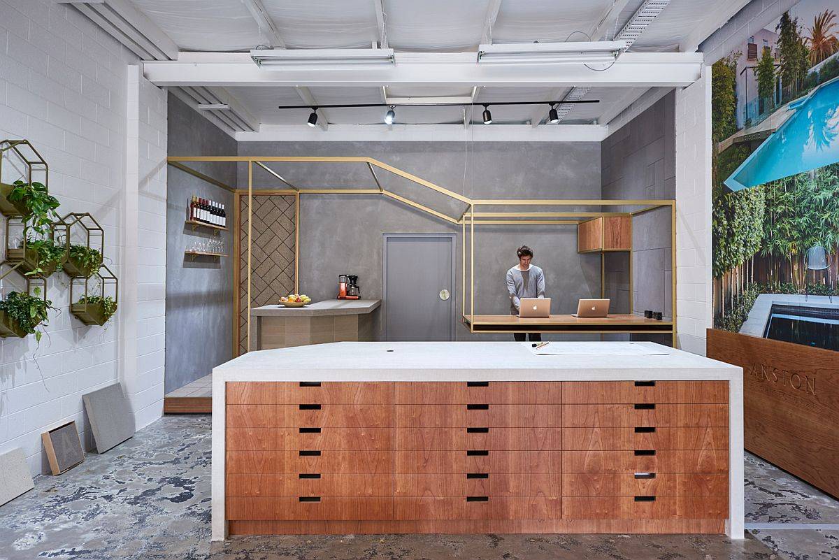 Island-wine-bar-and-communal-workstation-showcased-inside-the-showroom-43807