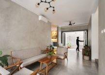 Living-area-on-the-inside-in-concrete-and-white-with-space-savvy-features-17613-217x155