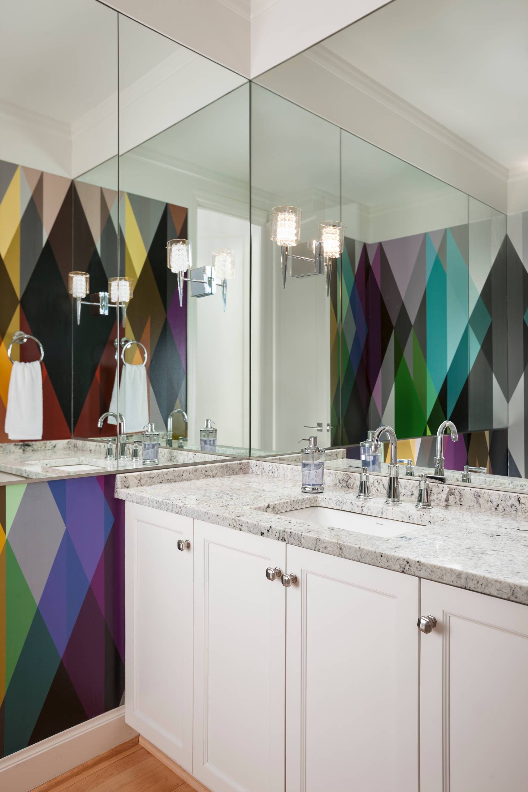 Multi-colored, snazzy wallpaper for the modern bathroom in white