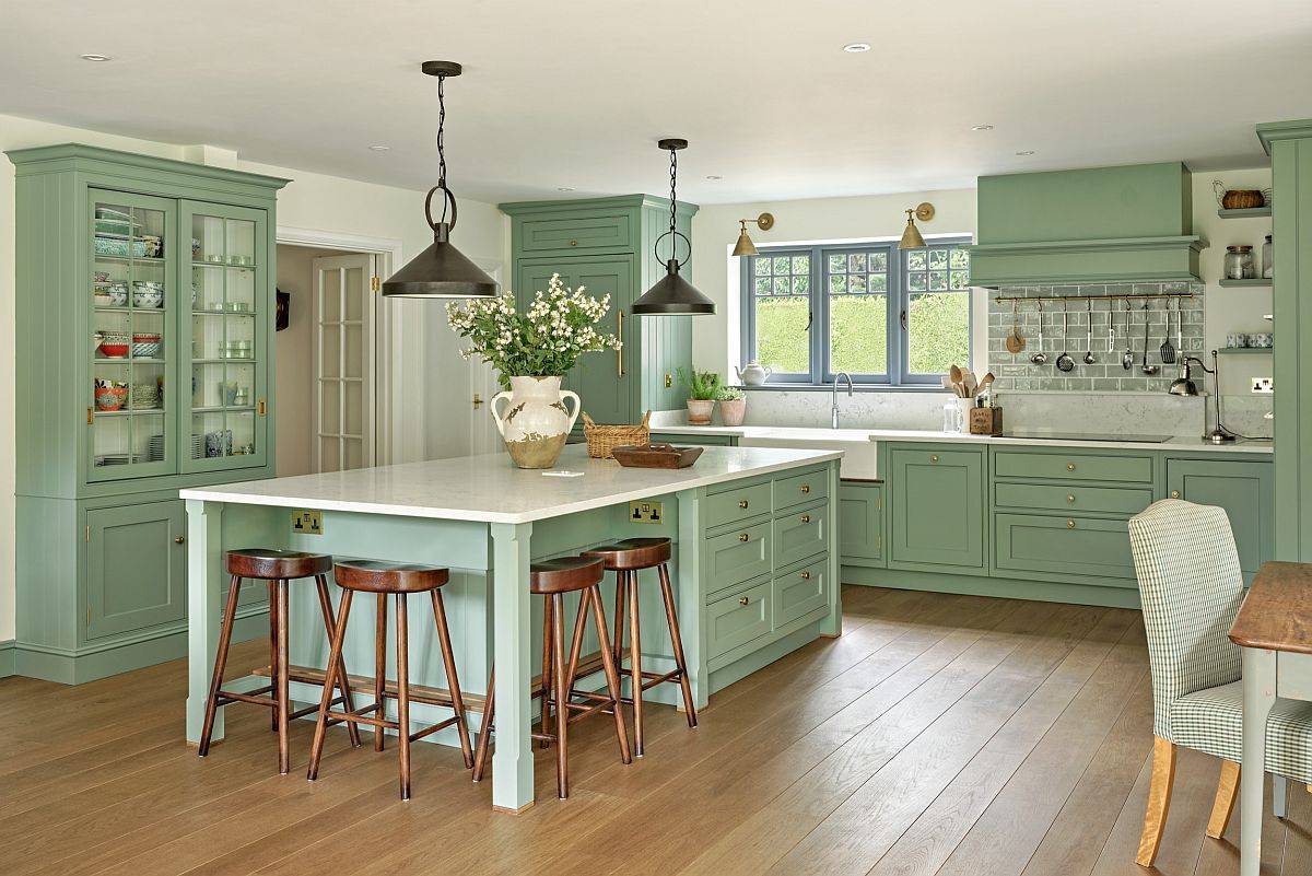 Pastel green and white kitchen feels picture-perfect indeed!