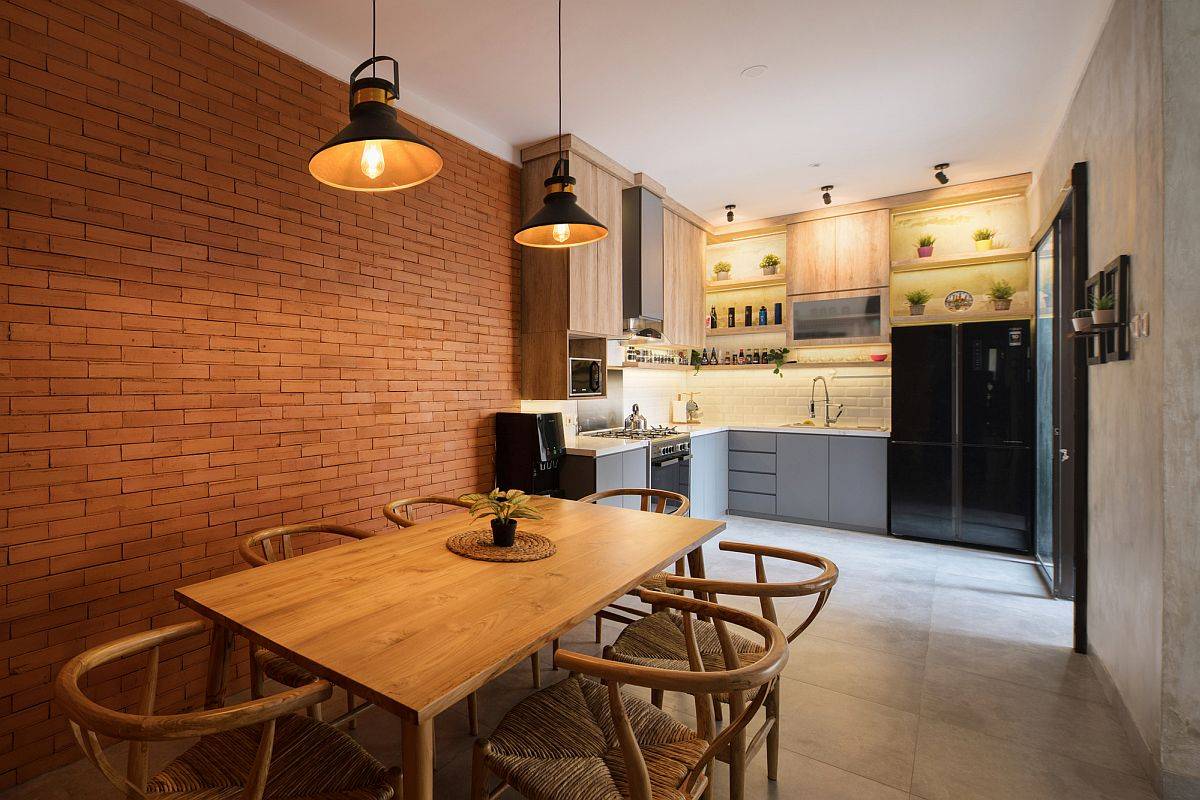 Small-kitchen-and-dining-area-of-the-lovely-Indonesian-home-withe-xposed-brick-walls-and-concrete-finishes-39640