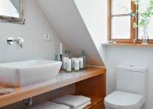 Small-wood-and-white-bathroom-with-terazzo-flooring-and-a-vanity-that-offers-ample-storage-space-79593-217x155