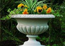 stone planter with colorful arrangement