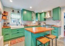 Bright-and-beautiful-modern-kitchen-is-draped-in-a-lovely-shade-of-sea-green-along-with-blue-for-the-island-14591-217x155