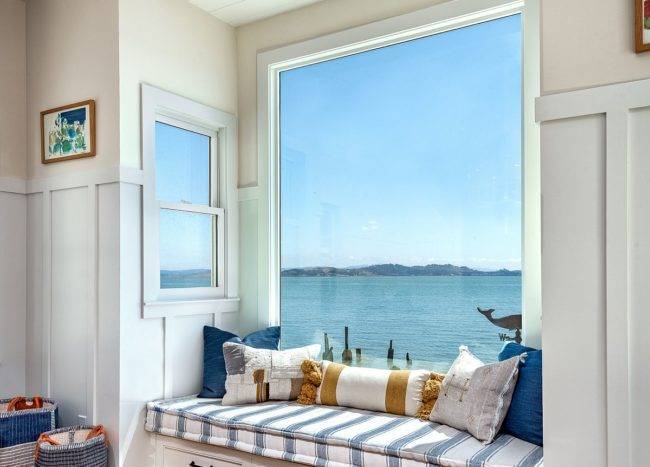 Coastal-style-built-in-bench-is-just-perfect-for-this-family-room-with-ocean-views-92705-217x155