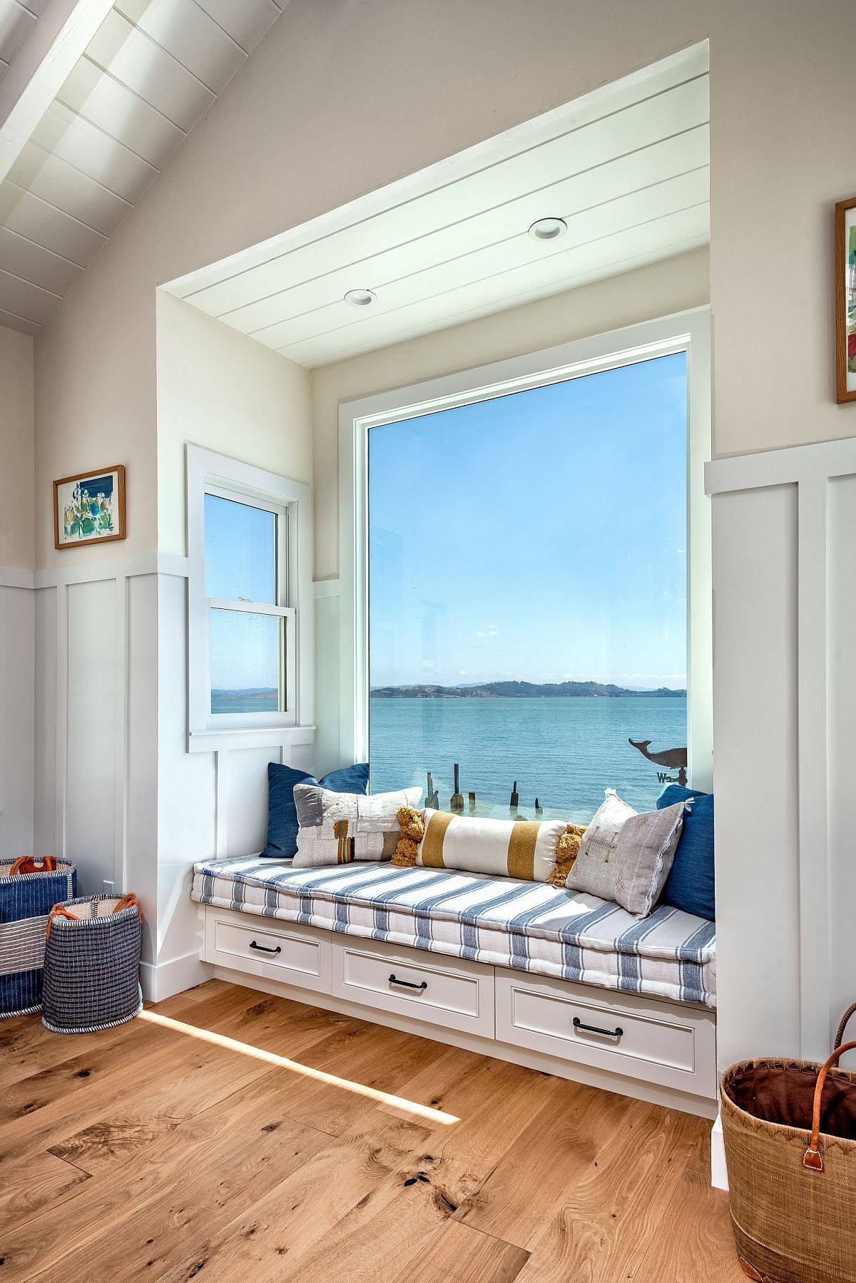 Coastal style built-in bench is just perfect for this family room with ocean views