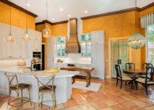 Custom-textured-walls-in-orange-make-the-biggest-visual-impact-in-this-spacious-mdoern-kitchen-94331-217x155