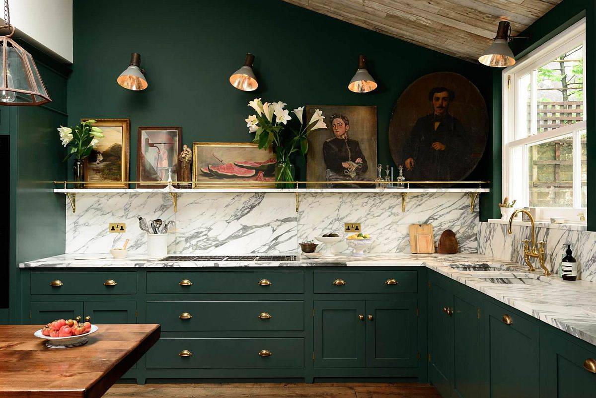 Deep green combined with metallics makes for a trendy and dashing traditional kitchen