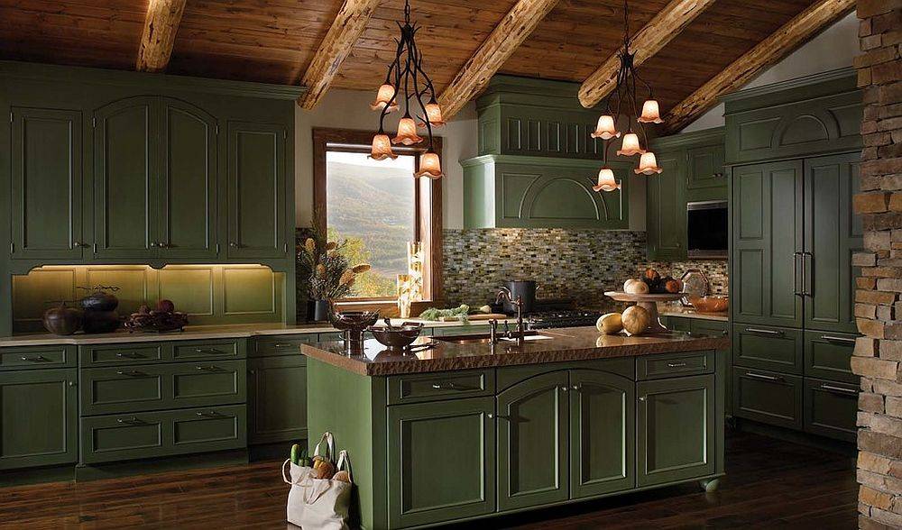 Elegant green cabinets in the gallery kitchen showcase how the color cuts across style barriers