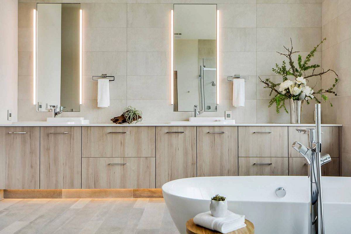 LED back-lit mirrors add a touch of class to the bathroom without trying too hard