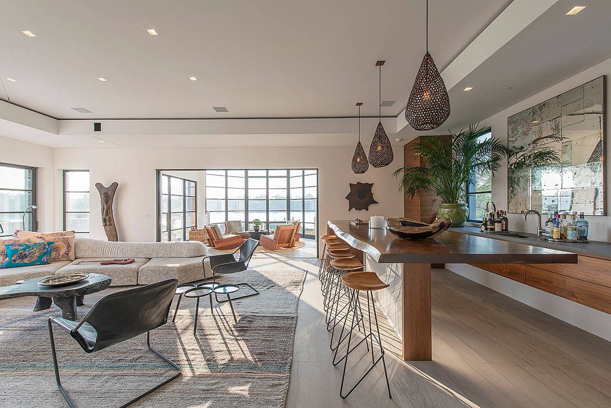 Live-edge counter in this kitchen seems to float mid-air thanks to its brilliant design