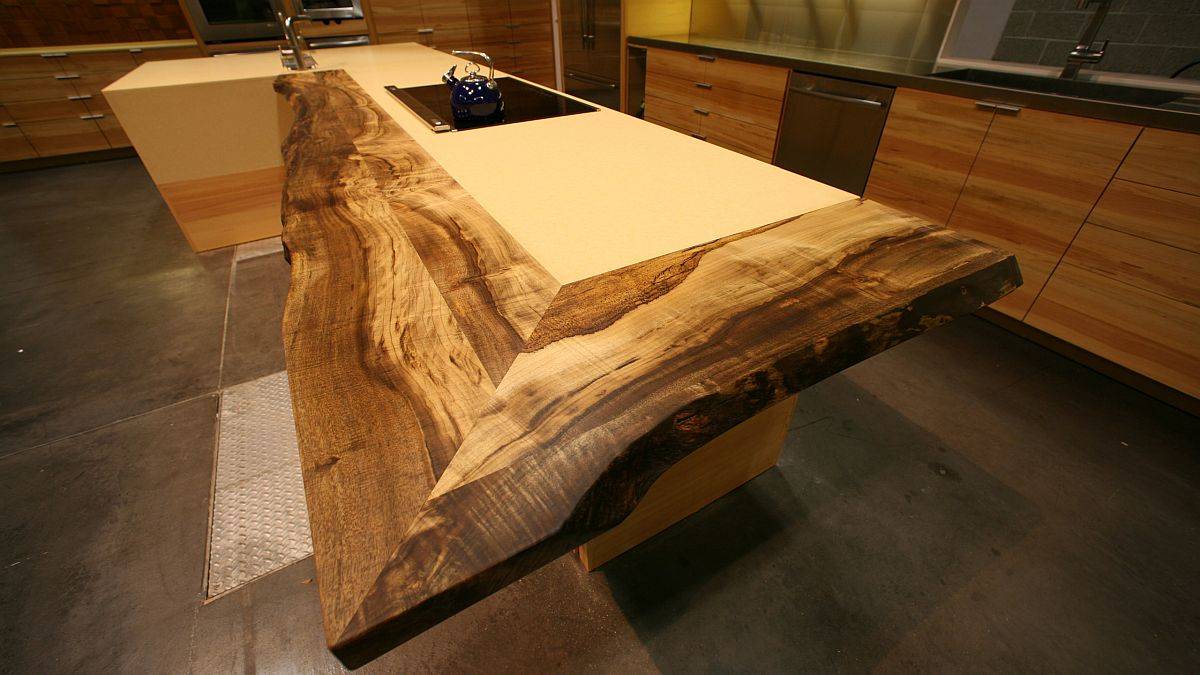 Live-edge-reclaimed-wood-counter-added-to-the-traditional-kitchen-island-in-an-eye-catching-manner-64758