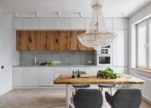 Live-edge-table-and-woodsy-cabinets-add-a-cozy-appeal-to-the-white-kitchen-51383-217x155