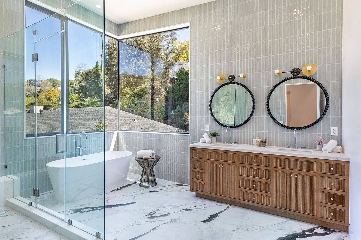 Marble floors easily steal the spotlight in this contemporary LA bathroom