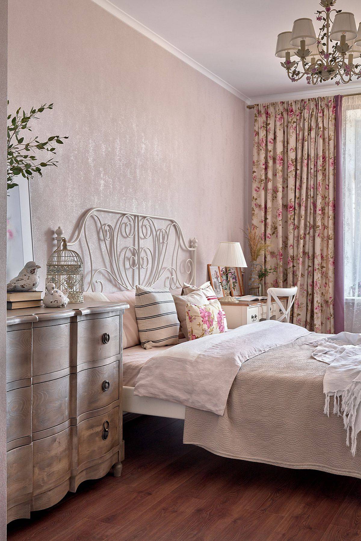 Pastel hues and floral patterns accentuate the shabby chic appeal of this modern bedroom
