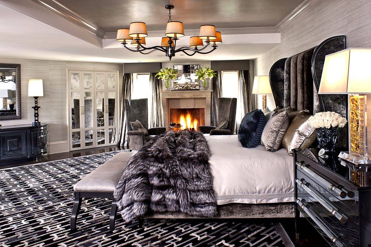 Polished bedroom with fireplace and a super-comfortanle headboard with velvet finish