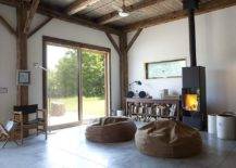 Stacked-firewood-and-modren-fireplace-bring-warmth-to-this-living-room-58109-217x155
