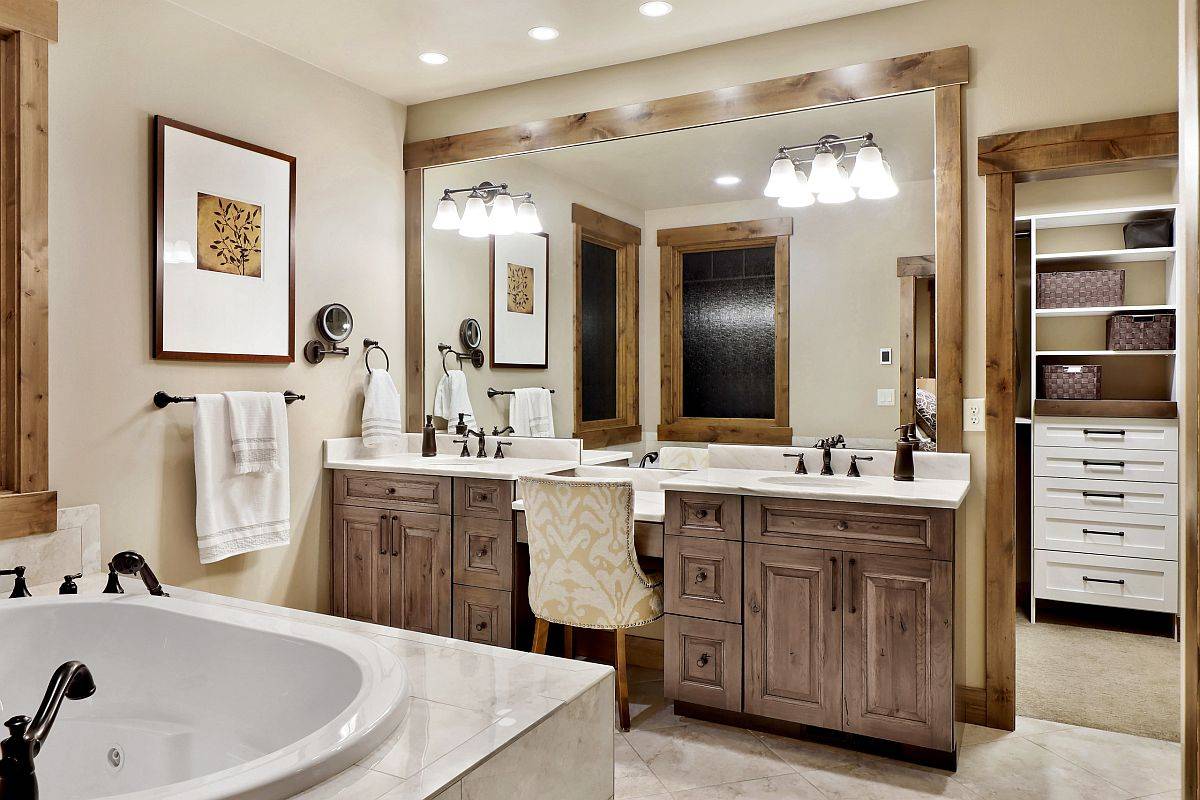 Vanity and the wooden frames add rustic beauty to this modern bathroom