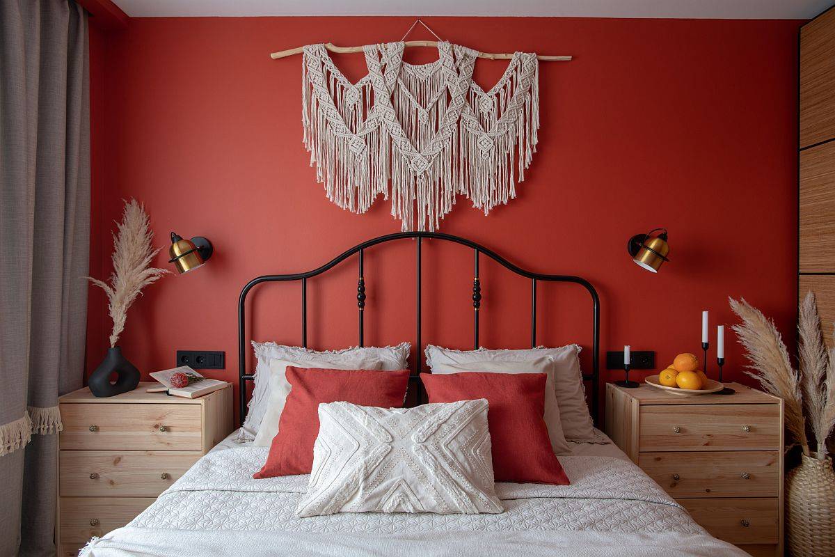 Vases and woven wall art piece add a hint of shabby chic charm to the small modern bedroom