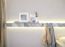 Decorating-the-slim-floating-shelf-in-stone-that-offers-additional-storage-space-15389-217x155