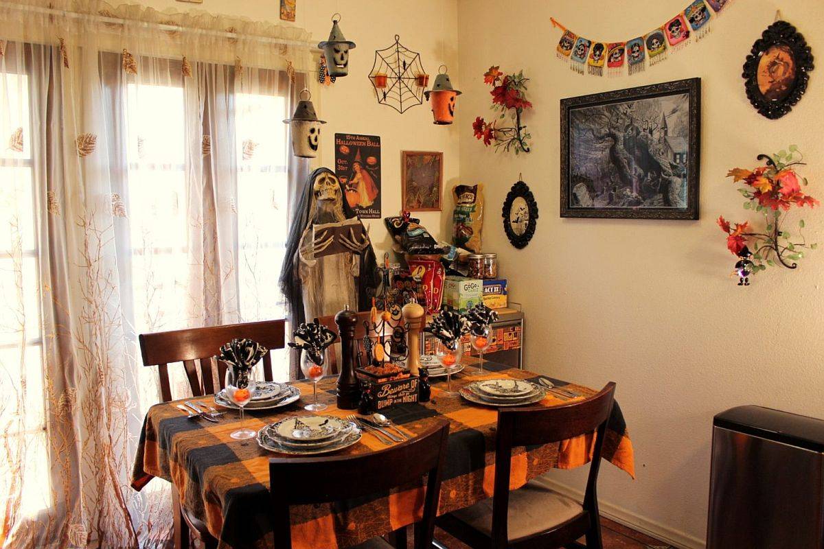 Halloween-themed kitchen decorations completely alter teh ambiance of this once cozy space