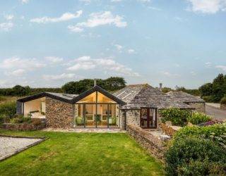Stone Walls and Scenic Views Welcome You at this Timeless Cornwall Home