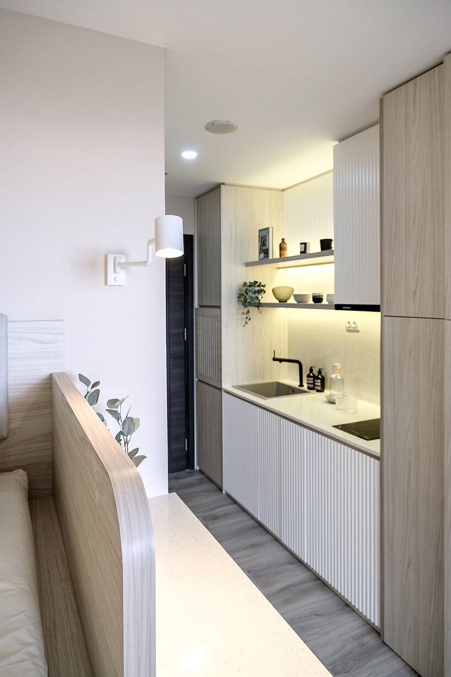 Ultra-small single-wall kitchen at the start of the apartment