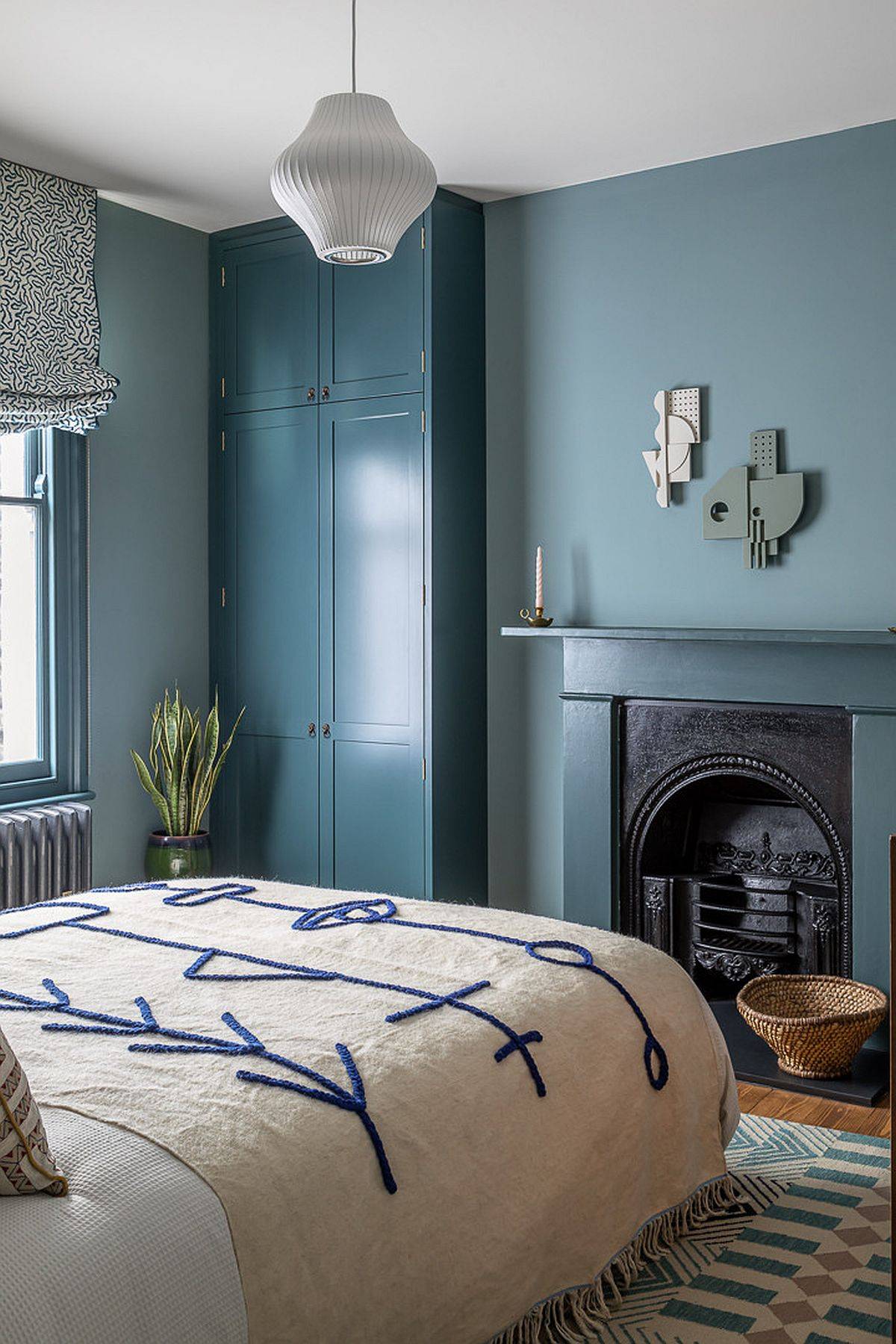 Blue is a relaxing shade for the modern eclectic bedroom that helps you sleep easily