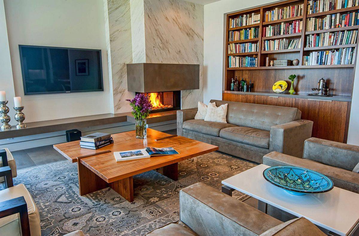 Combine the bookshelf or the entertainment unit with the corner fireplace for a more curated look