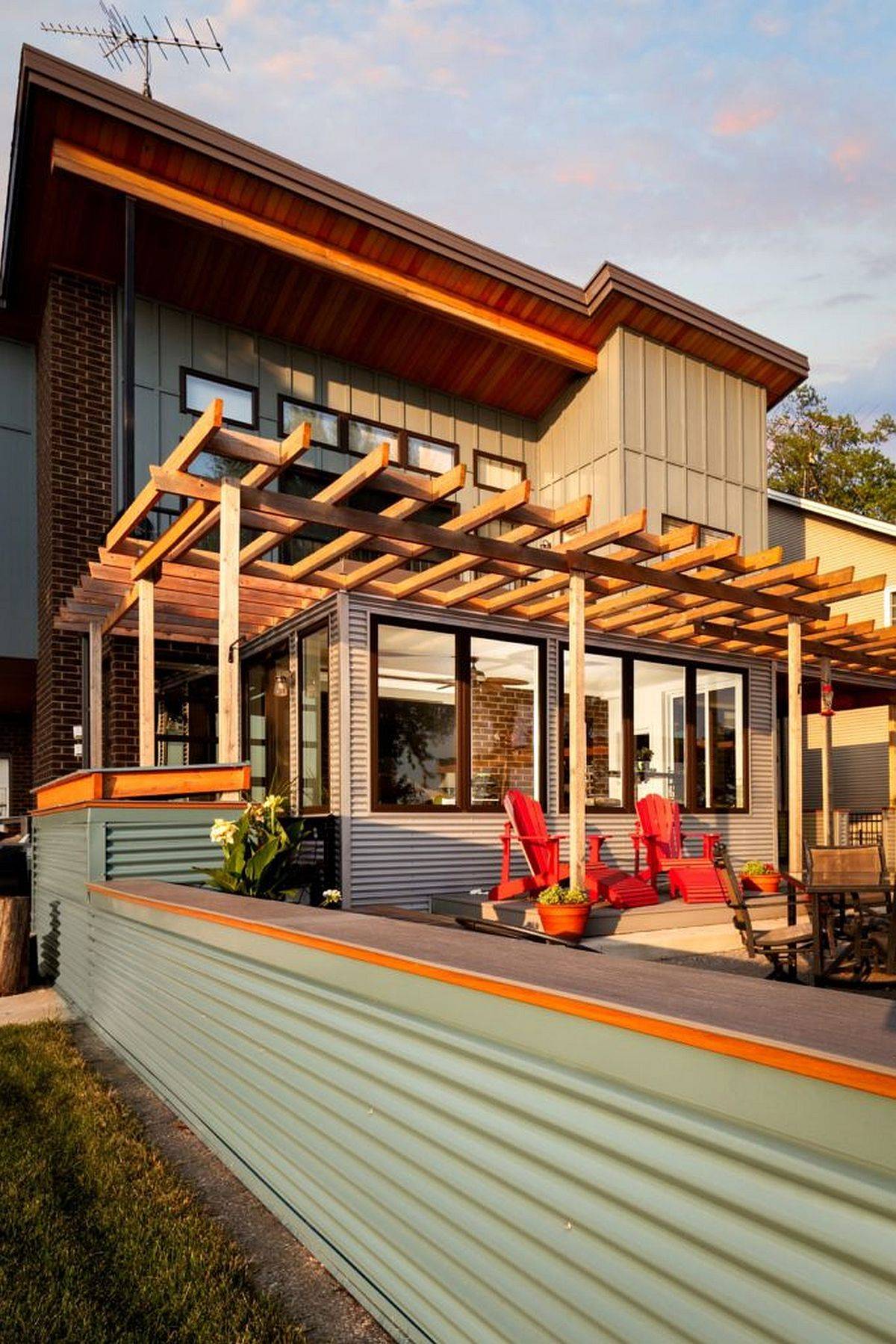 Custom-cedar-trellis-coupled-with-corrugated-metal-siding-shape-the-exterior-of-the-new-addition-81403