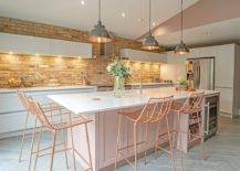 Dashing-kitchen-with-brick-wall-backsplash-and-engineered-quartz-countertops-90400-217x155