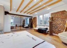 Exposed-wooden-ceiling-beams-brick-walls-and-a-backdrop-in-white-for-the-classy-eclectic-bedroom-52617-217x155