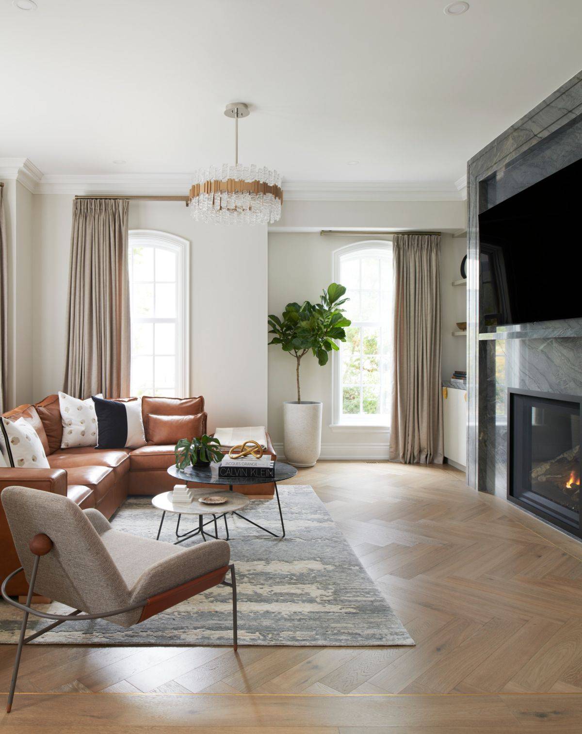 Fireplace is the focal point of this contemporary family room