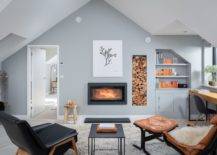 Gorgeous-modern-beach-style-living-room-in-gray-with-a-lovely-fireplace-and-stacked-firewood-next-to-it-61784-217x155