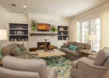 Modern-beach-style-living-room-with-a-cozy-firelace-that-becomes-the-focal-point-in-winter-months-50640-217x155