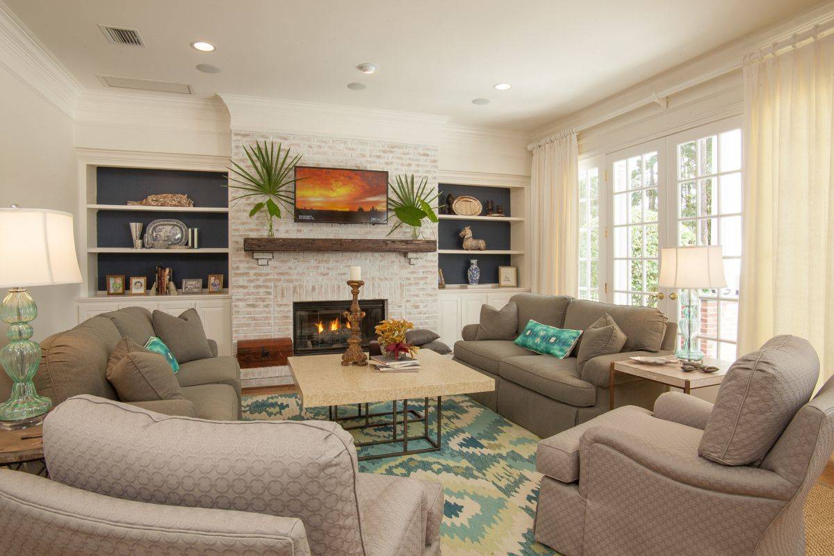 Modern-beach-style-living-room-with-a-cozy-firelace-that-becomes-the-focal-point-in-winter-months-50640