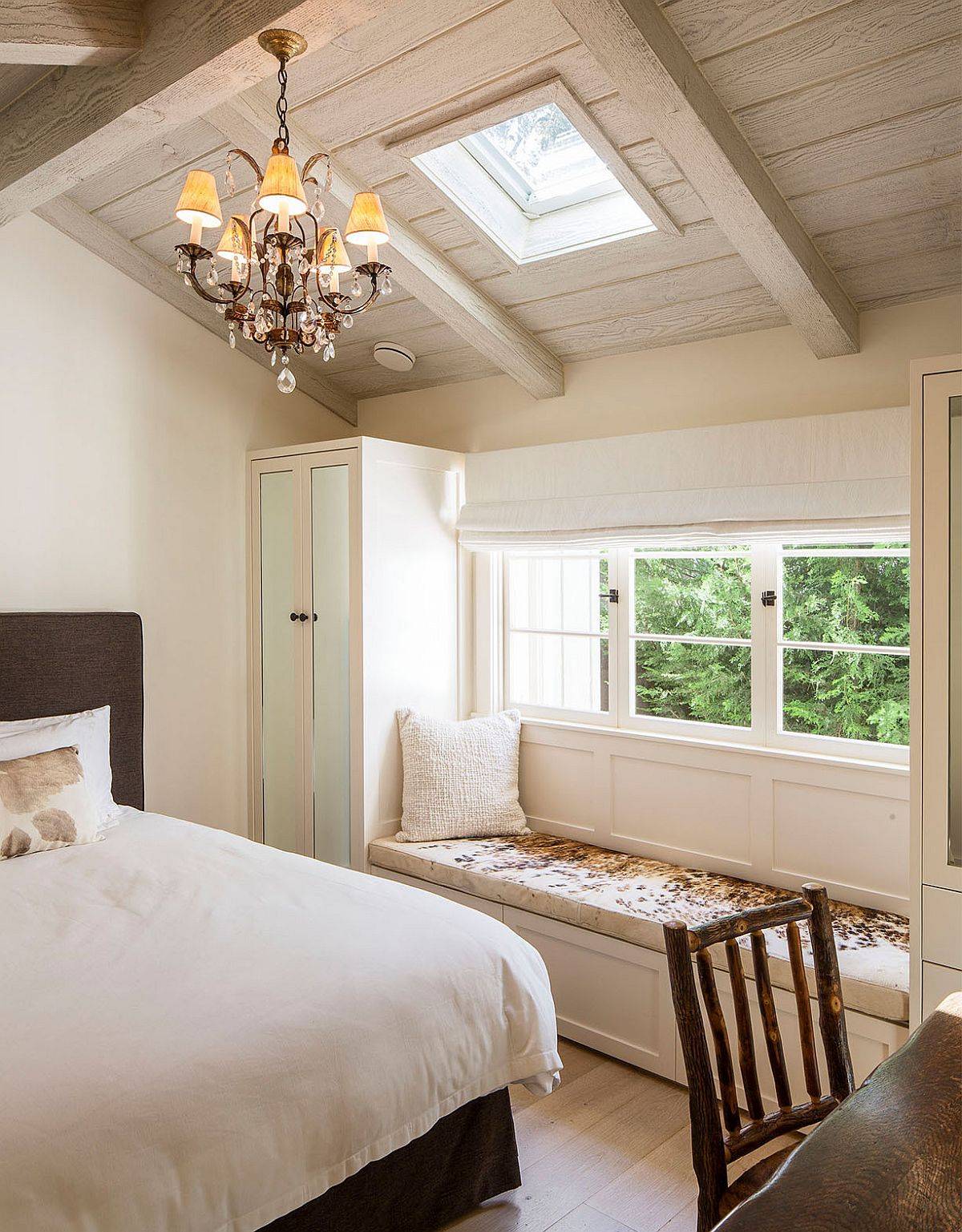 Small-skylight-and-a-lovely-bay-window-connect-this-bedroom-with-the-view-outside-while-ushering-in-ample-natural-light-99420