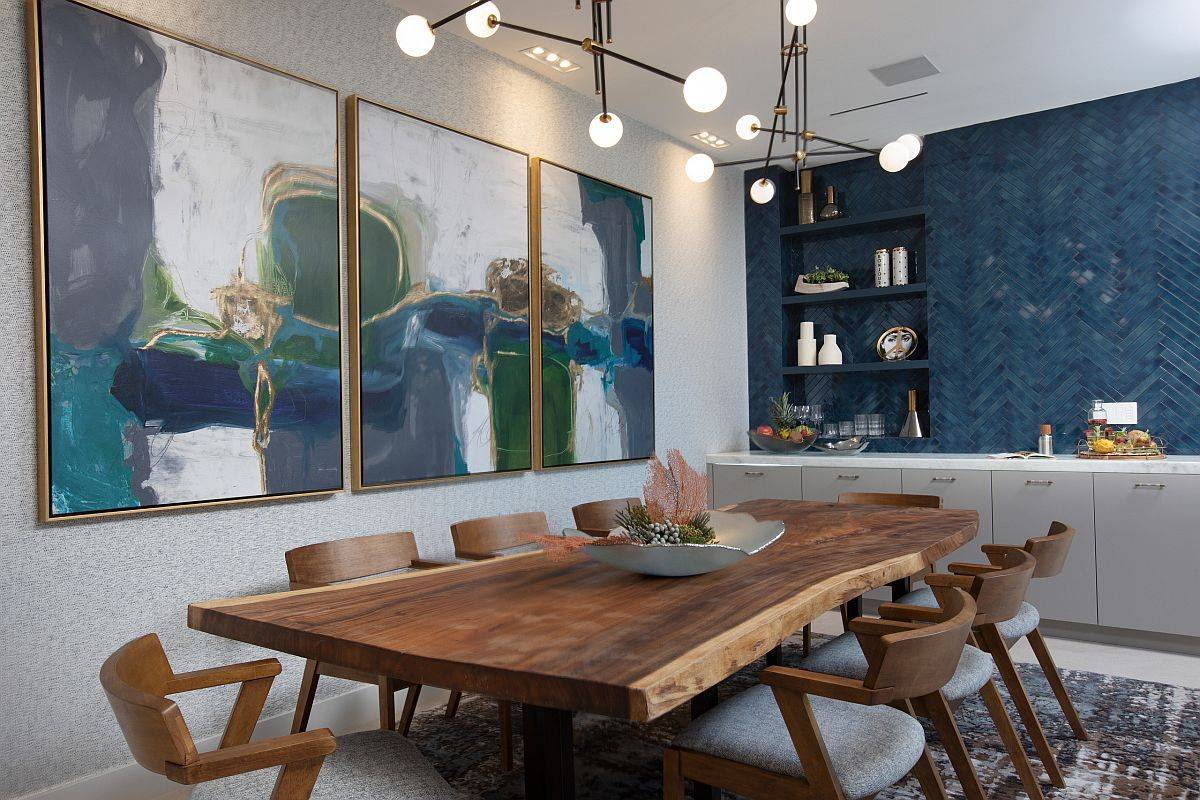 Deck Your Dining Room With Wall Art For Holiday Season And Beyond   Striking Wall Art In This Dining Room Steals The Spotlight Despite The Lovely Serving Area Natural Wooden Table And Lovely Blue Background 20051 