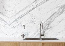 Take-a-closer-look-at-the-marble-backsplash-of-the-kitchen-along-with-sparkling-faucets-76560-217x155