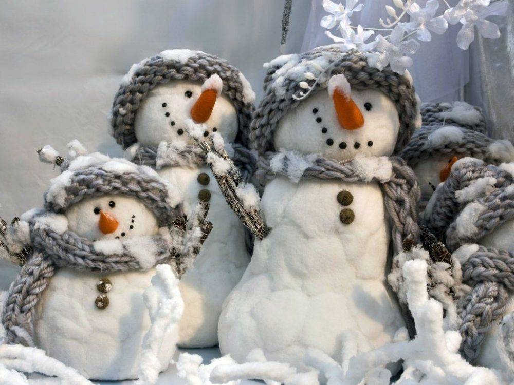 Cute and cuddly cotton snowman DIY is a great way to decorate porch