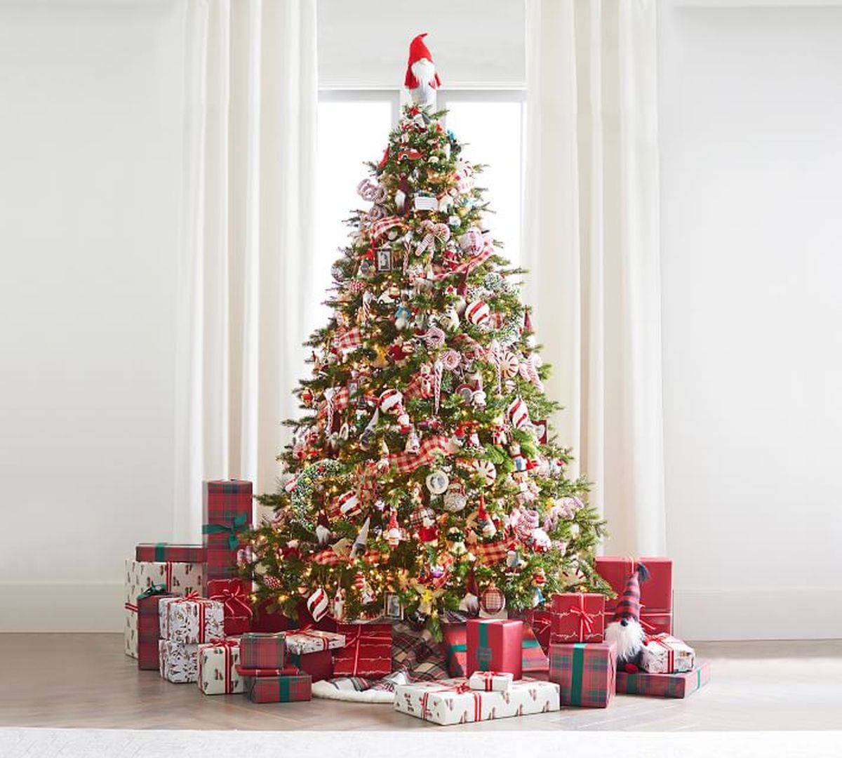 Finding the right Christmas tree topper that matches color palette of your decorating theme