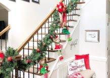 Fun-way-to-decorate-the-entry-with-stairs-using-a-Christmas-garland-and-some-elves-38161-217x155
