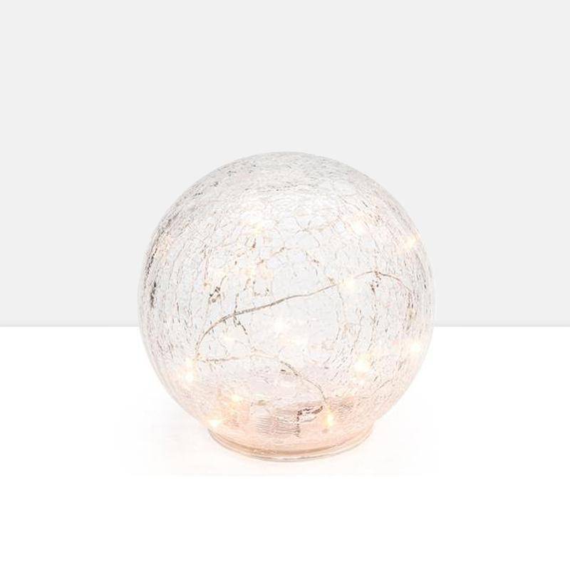 Glowing orb for enhancing your curated decor from Burke Decor
