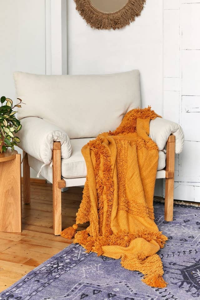 Aden Tufted Throw Blanket from Urban Outfitters