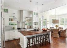 Beach-style-kitchen-with-wood-and-white-color-scheme-that-is-connected-to-the-dining-space-83991-217x155
