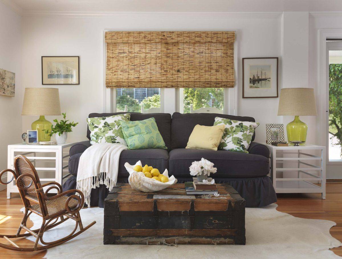 Beautiful modern bach style living room with a vintage trunk turned into coffee table