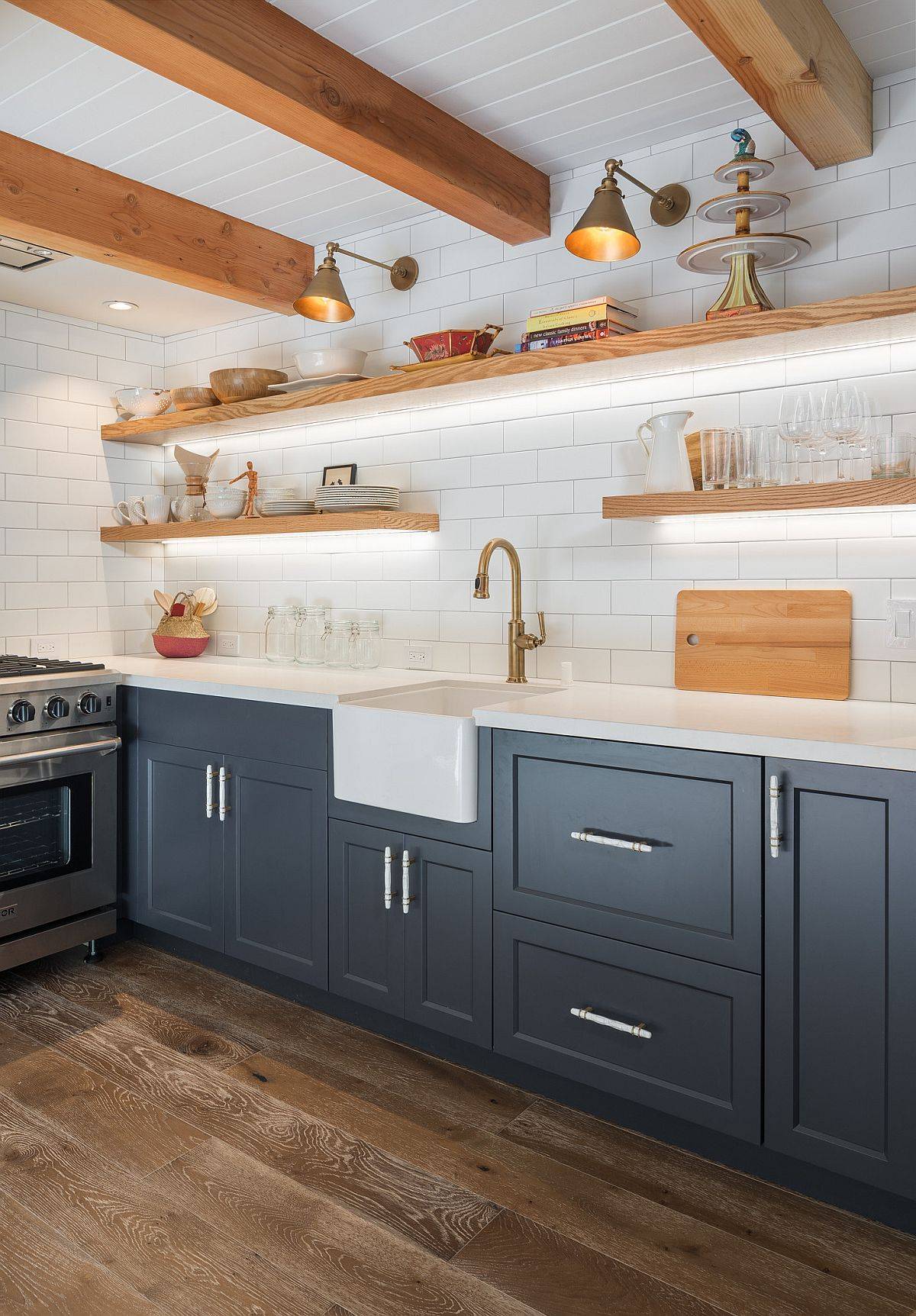 Beautiful white and blue kitchen with exposed wooden beams