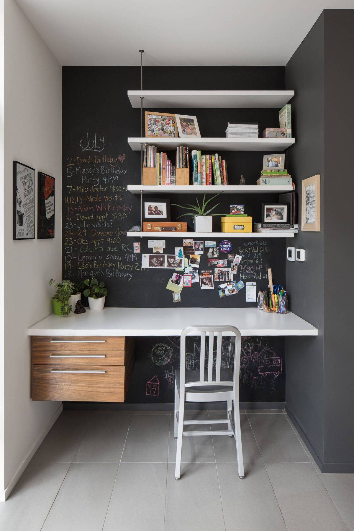 Chalkboard wall and an adaptable desk design with storage makes for a convenient home office