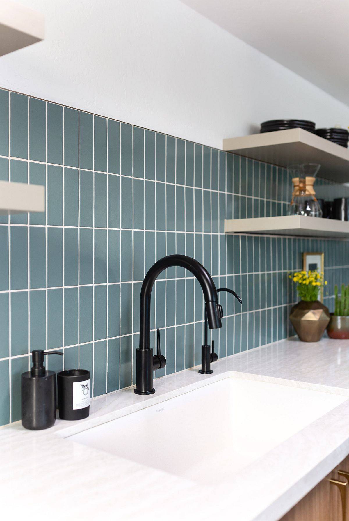 Closer look at the modern green-blue kitchen tiles used for the backdrop