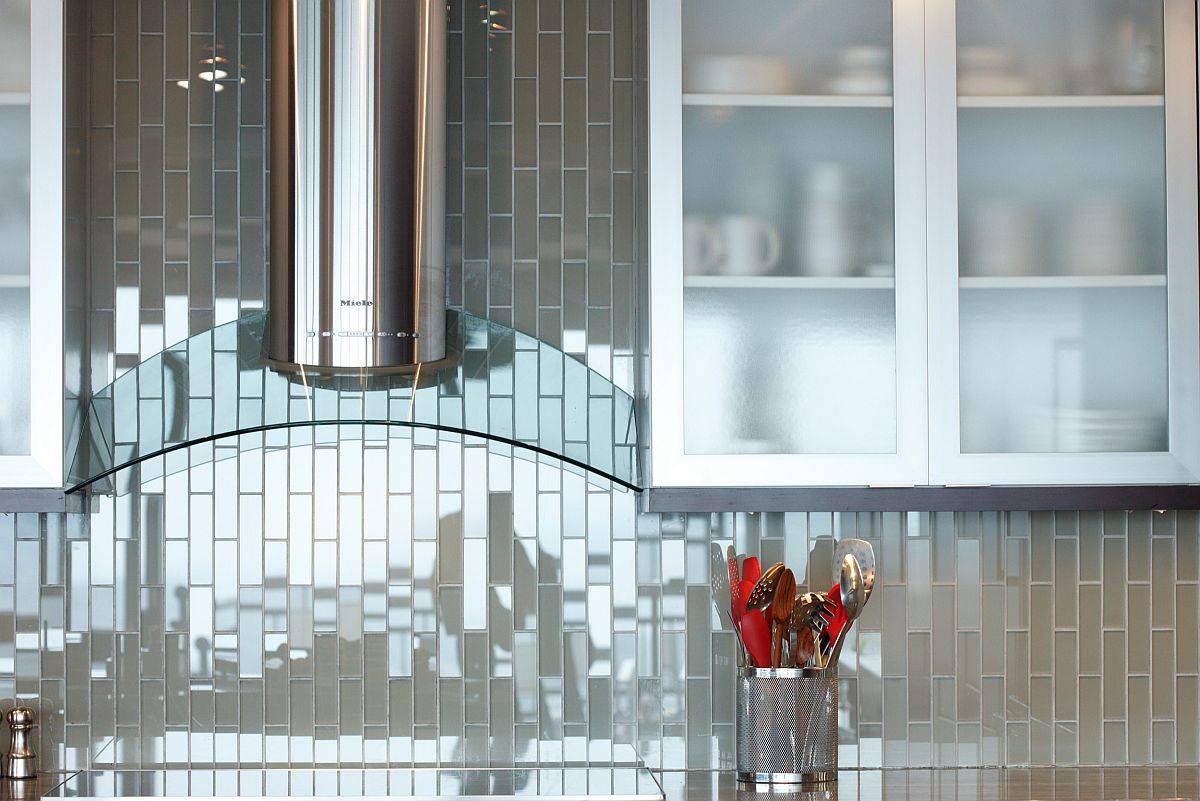 Contemporary kitchen with vertical tile backsplash that has a glossy finish